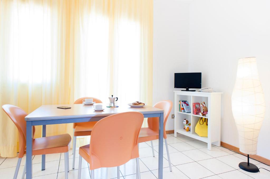 A television and/or entertainment centre at Welcome Residence per famiglie