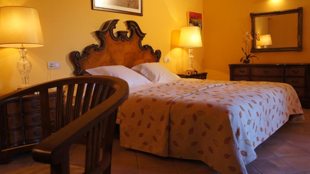 Postel nebo postele na pokoji v ubytování Petit Hotel Alaro
