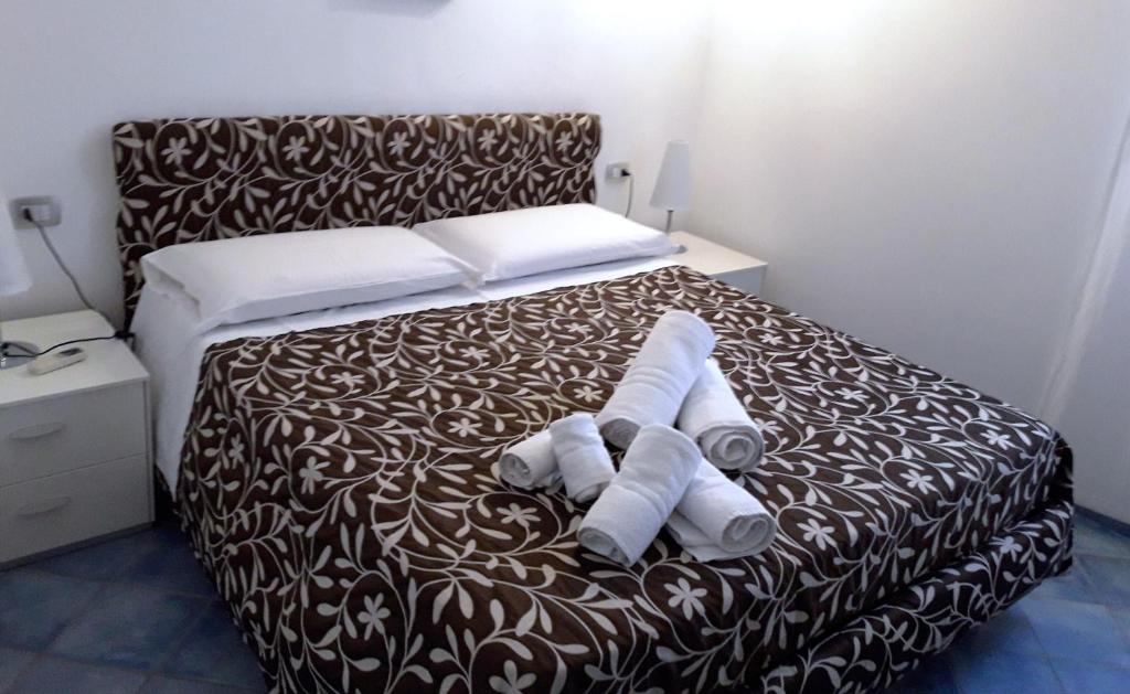 A bed or beds in a room at Villa Lucia