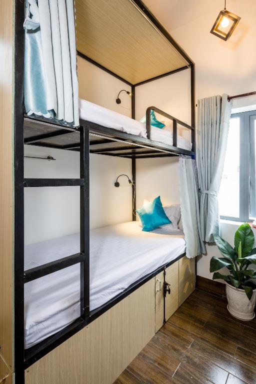 Postel nebo postele na pokoji v ubytování Fedora Hostel