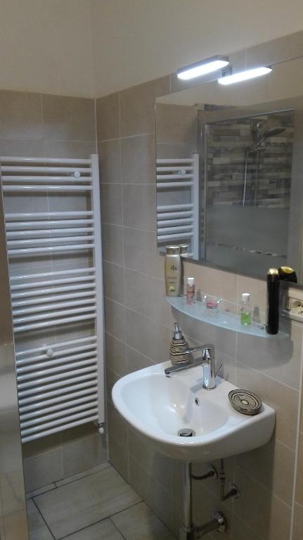 Kúpeľňa v ubytovaní Scala Apartment