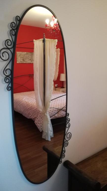 Postel nebo postele na pokoji v ubytování L'ISOLA AeR B&B