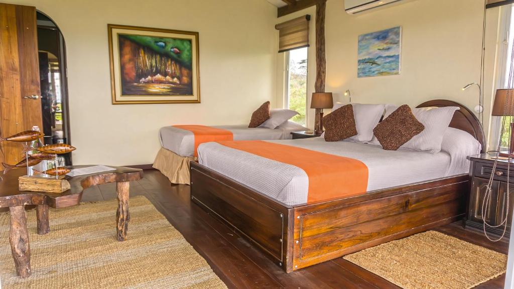 Postel nebo postele na pokoji v ubytování Semilla Verde Boutique Hotel