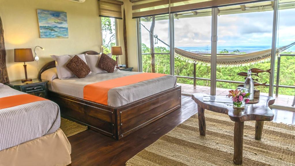 Postel nebo postele na pokoji v ubytování Semilla Verde Boutique Hotel