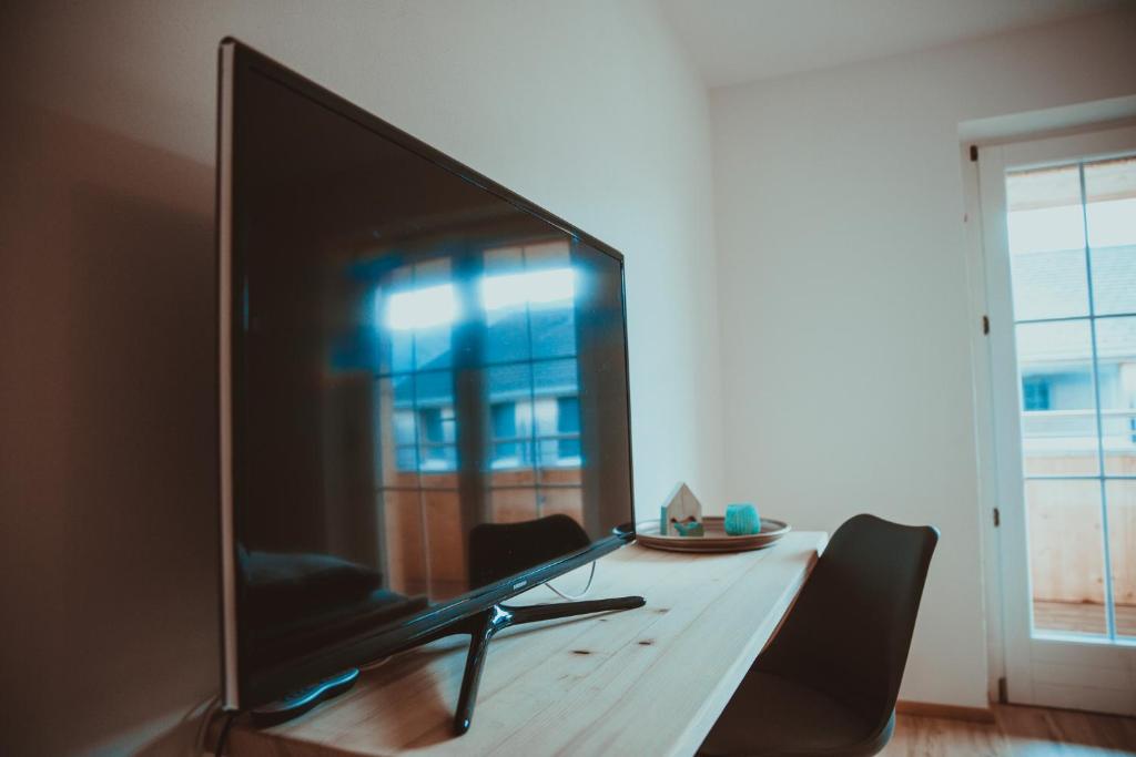 TV a/nebo společenská místnost v ubytování Ferienwohnung Thannen