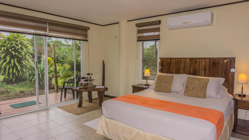 Postel nebo postele na pokoji v ubytování Semilla Verde Boutique Hotel