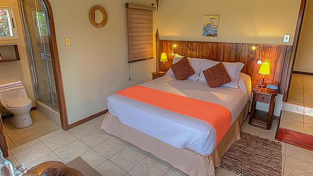 Postel nebo postele na pokoji v ubytování Semilla Verde Boutique Hotel