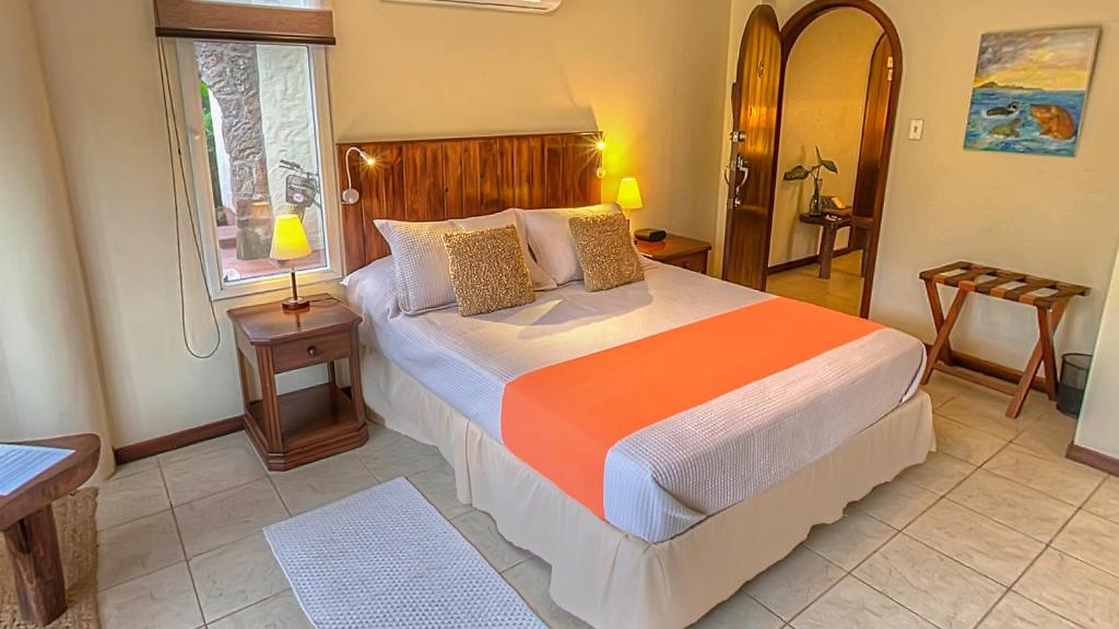 Postel nebo postele na pokoji v ubytování Semilla Verde Boutique Hotel