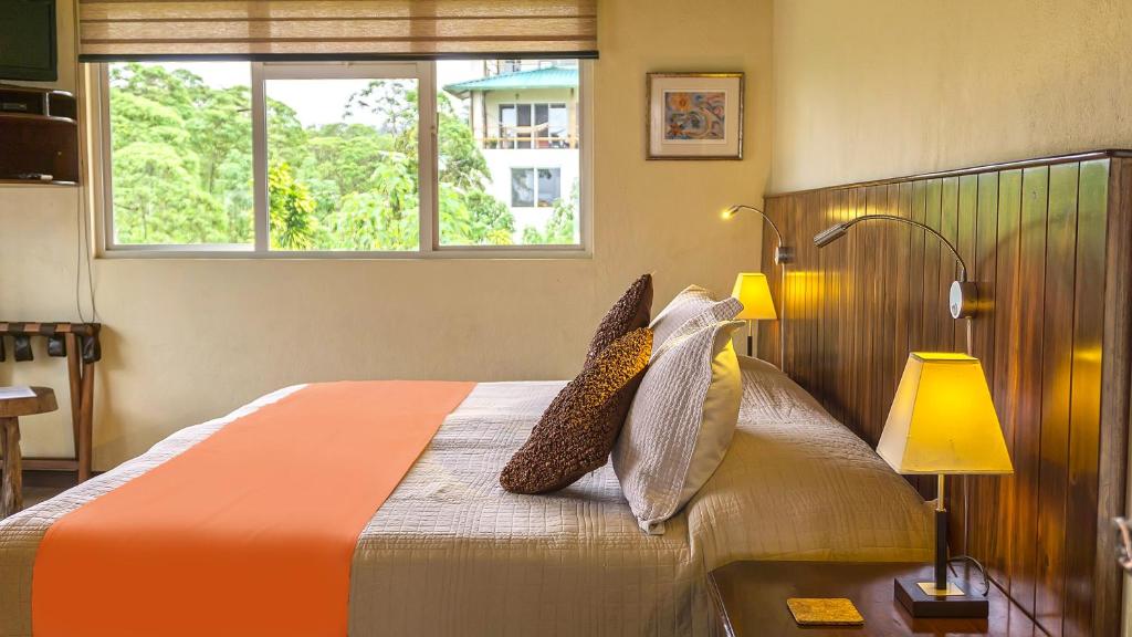Postel nebo postele na pokoji v ubytování Semilla Verde Boutique Hotel