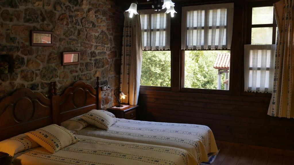 מיטה או מיטות בחדר ב-Hotel Rural Los Texos