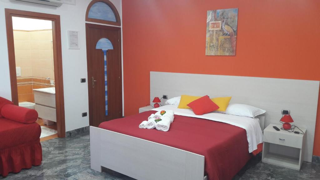 Łóżko lub łóżka w pokoju w obiekcie B&B Cornelia