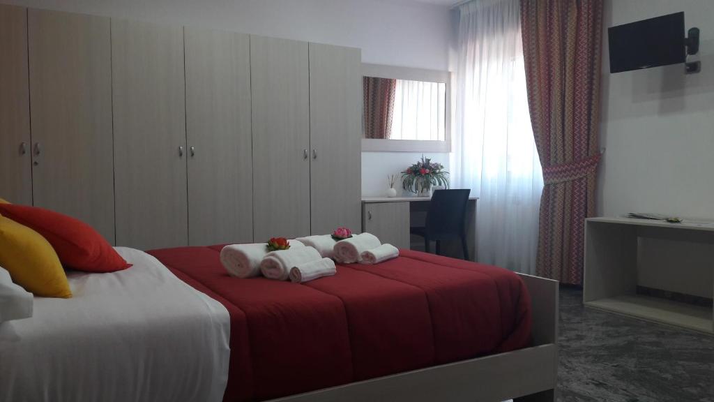 Łóżko lub łóżka w pokoju w obiekcie B&B Cornelia