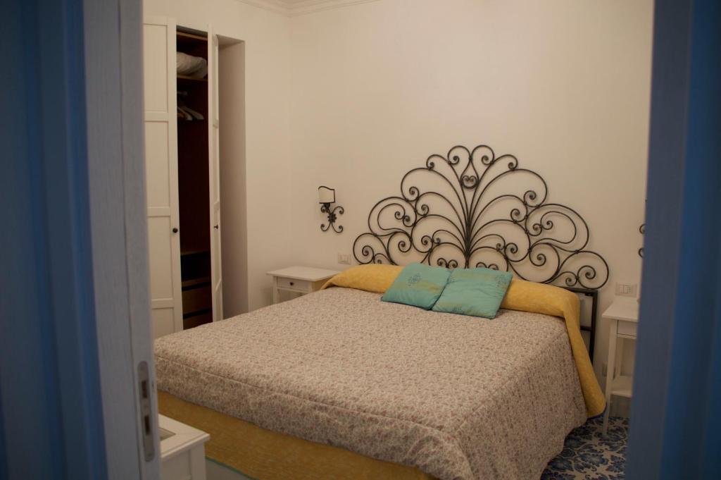 Postel nebo postele na pokoji v ubytování il Porto Capri Casa Vacanza
