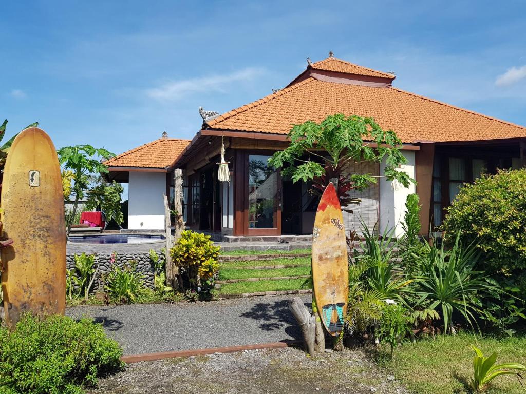 Zahrada ubytování Medewi Beachfront Getaway