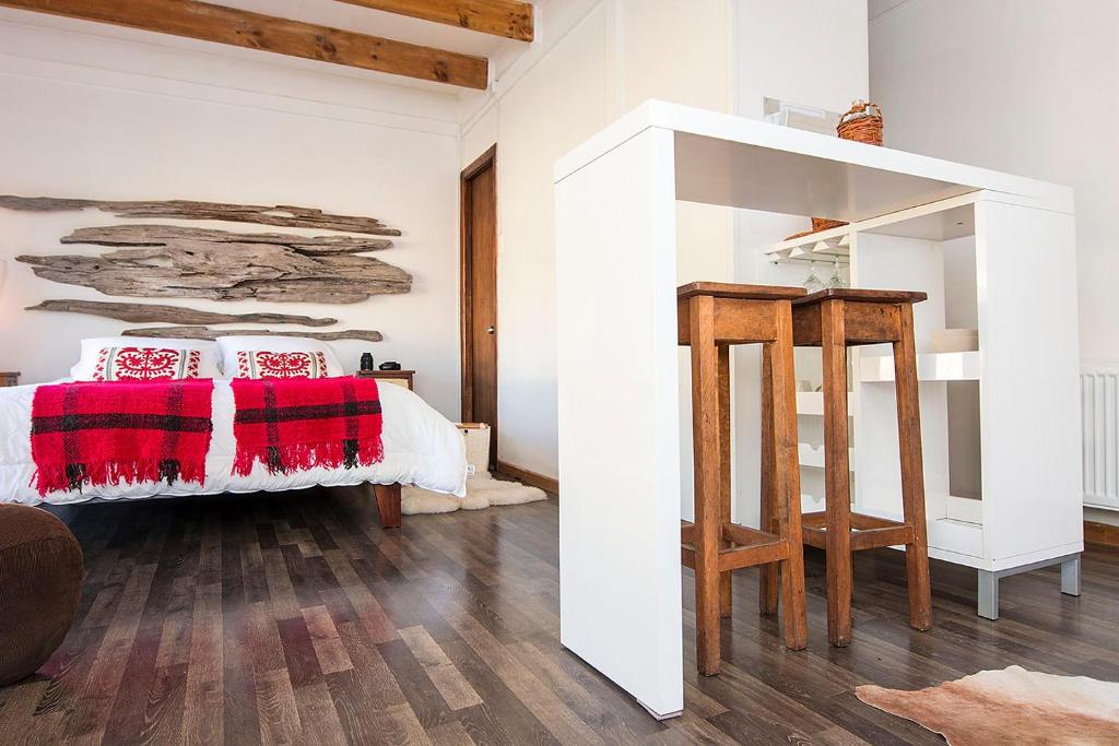 Postel nebo postele na pokoji v ubytování Bungalow by Toore Patagonia