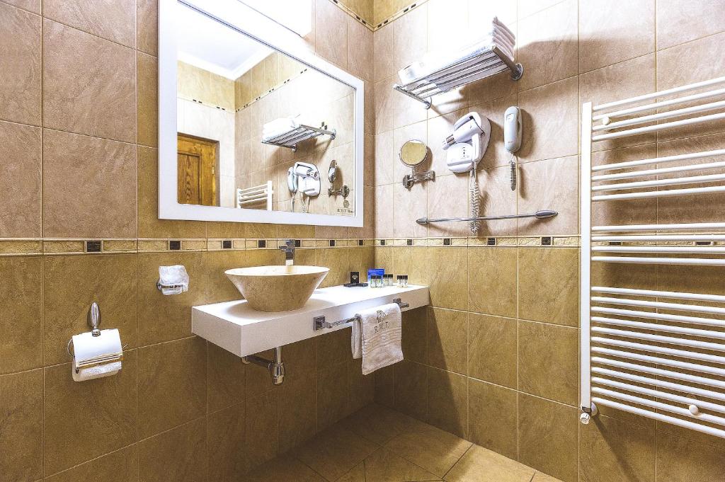 Koupelna v ubytování Hotel Athos R.M.T.