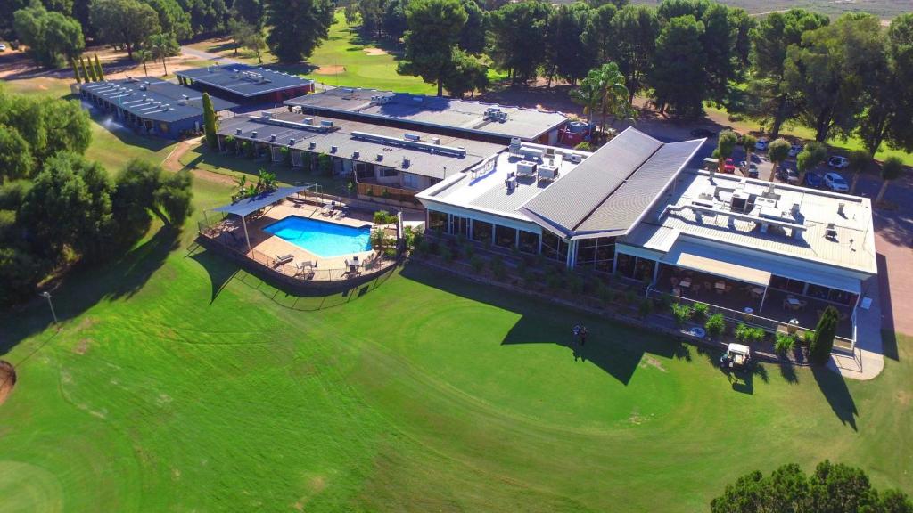a large building with a lot of trees at Renmark Country Club in Renmark