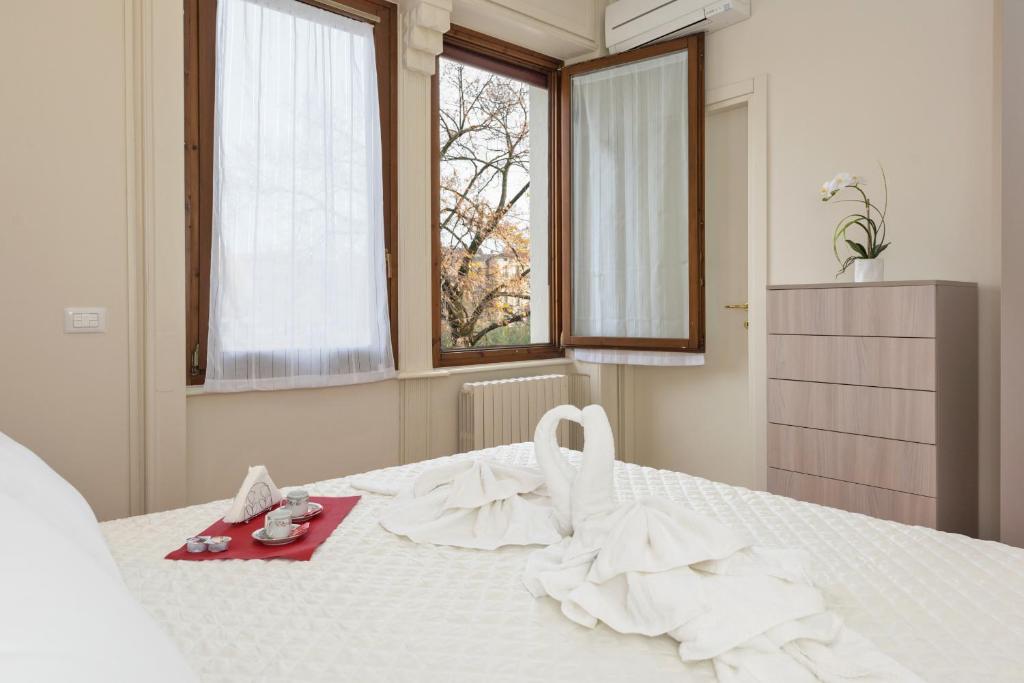Łóżko lub łóżka w pokoju w obiekcie RUBELE40