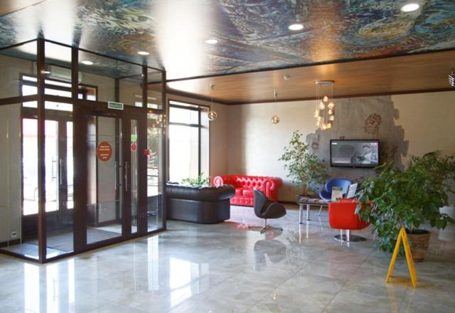 TV a/nebo společenská místnost v ubytování Hotel Chalpan