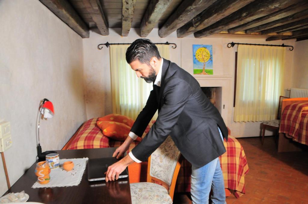 Hotel La Corte - Quadruple Room With Shared Bathroom
