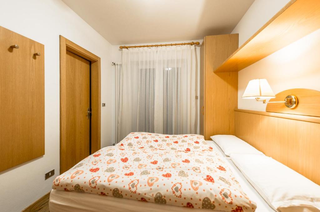 Postel nebo postele na pokoji v ubytování Garni Tyrolia