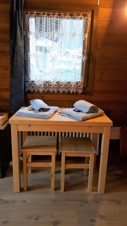 Postel nebo postele na pokoji v ubytování B&B La Genzianella