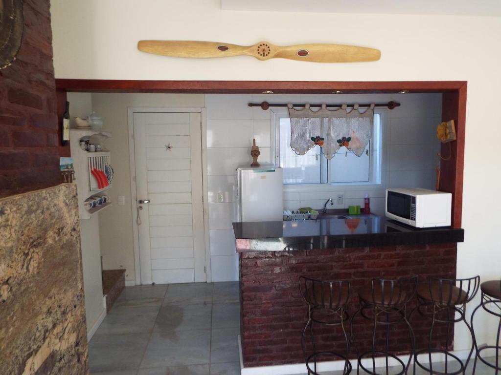  Casa 3 dormitórios sendo uma suíte com ar