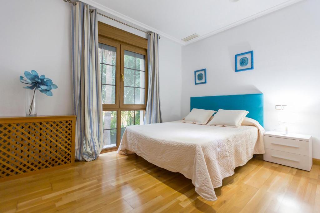 Łóżko lub łóżka w pokoju w obiekcie Chalet Villadulce