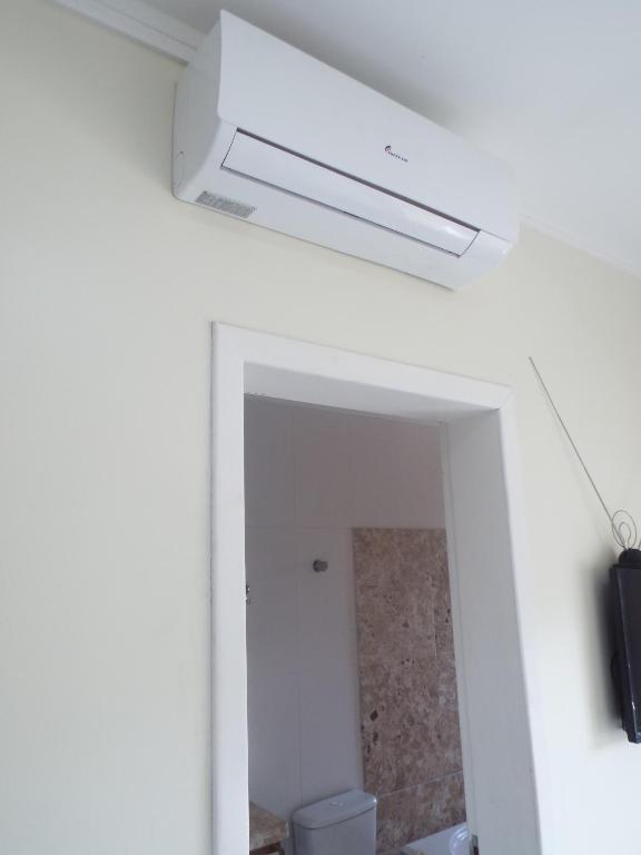  Casa 3 dormitórios sendo uma suíte com ar