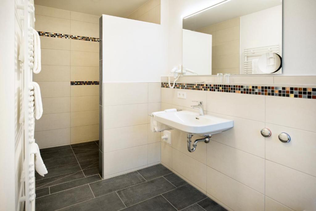 Koupelna v ubytování Gasthof Linde - Hotel Blum