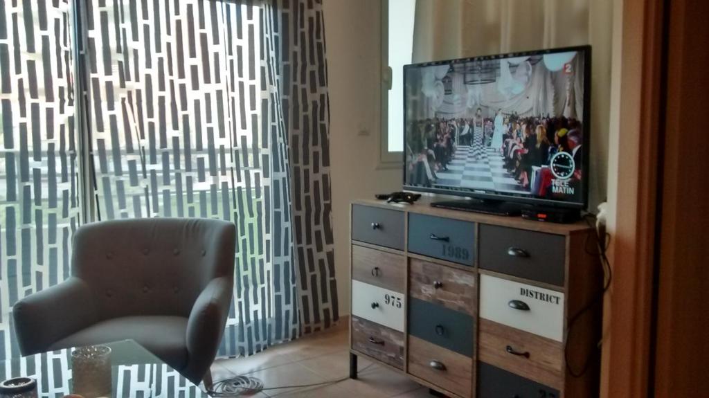 TV a/nebo společenská místnost v ubytování Victoria