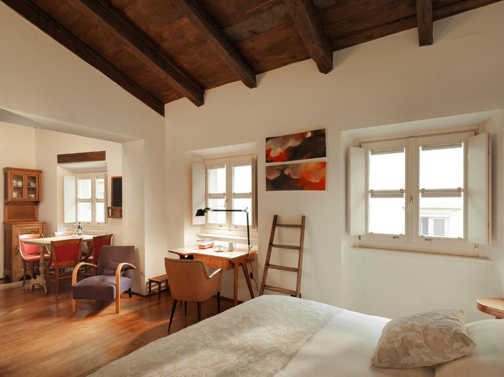 Postel nebo postele na pokoji v ubytování Boutique Hotel Albero Nascosto