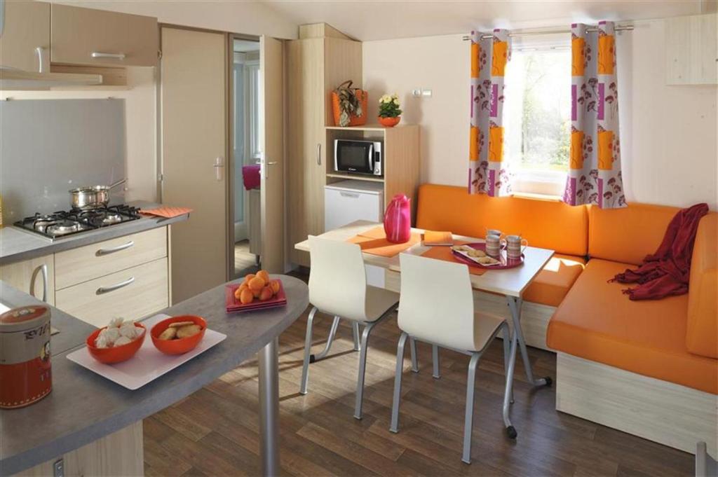 Kuchyň nebo kuchyňský kout v ubytování Bungalow Vacances