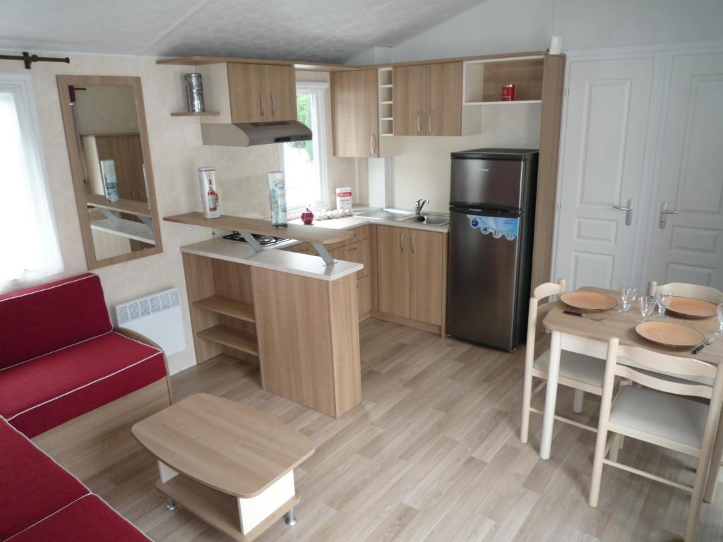 Kuchyň nebo kuchyňský kout v ubytování Bungalow Vacances