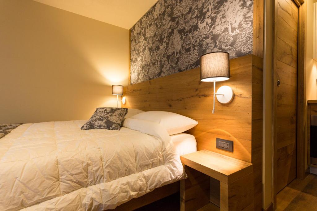 Postel nebo postele na pokoji v ubytování Maison Fosson