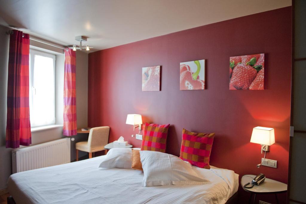 Postel nebo postele na pokoji v ubytování Hotel Le Charme de la Semois