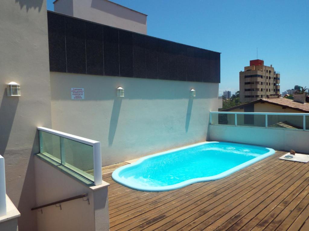  Casa 3 dormitórios sendo uma suíte com ar