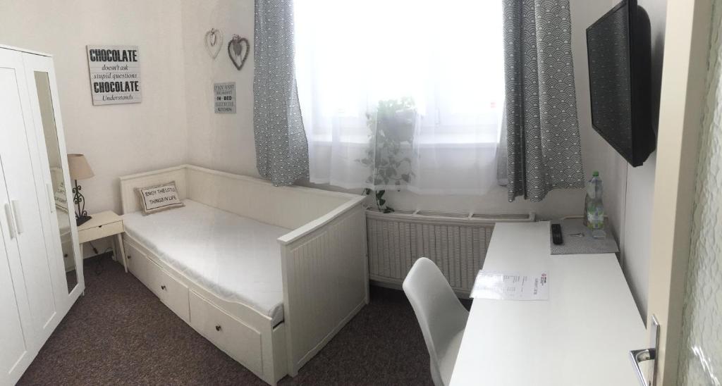 Postel nebo postele na pokoji v ubytování Penzion Ema B&B