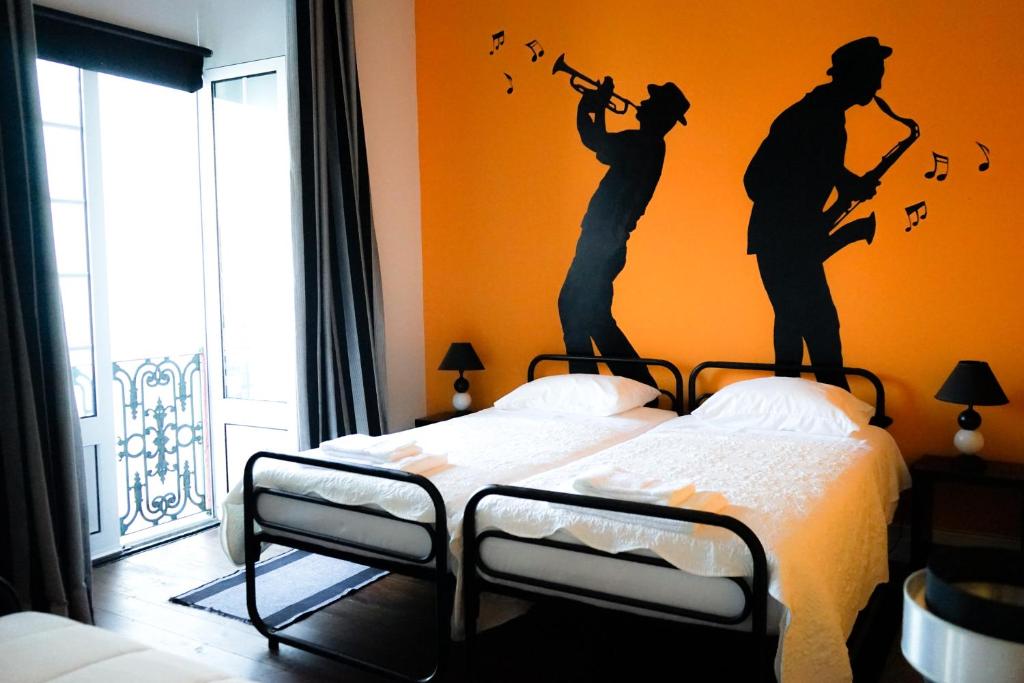 Postel nebo postele na pokoji v ubytování Azores Dream Hostel