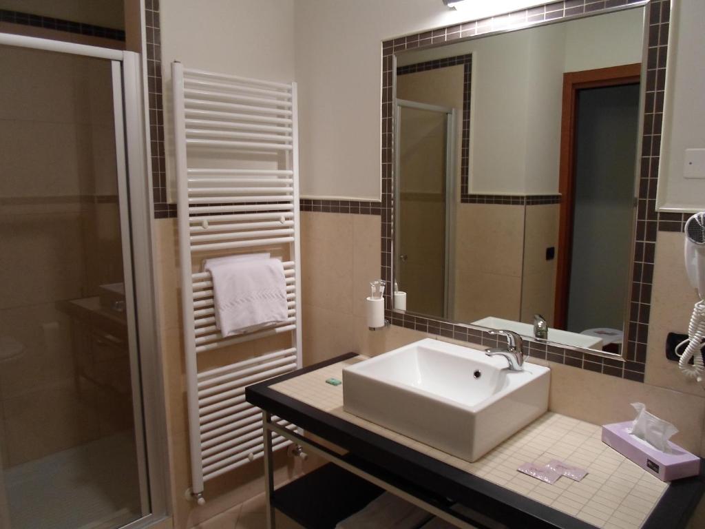 Koupelna v ubytování Hotel Le Macine