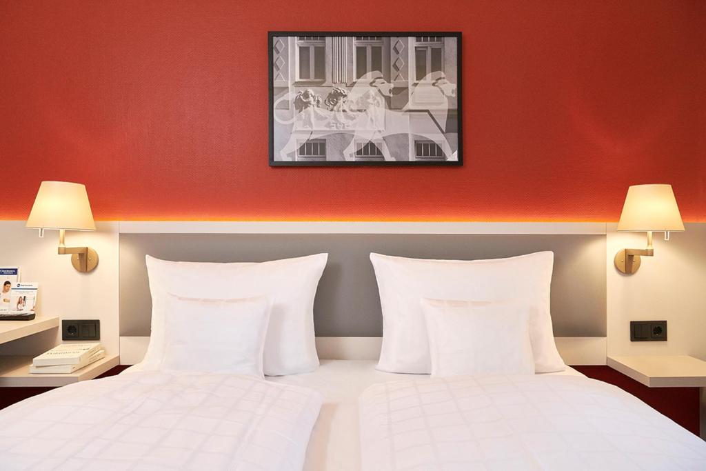 Postel nebo postele na pokoji v ubytování Best Western Hotel Leipzig City Centre