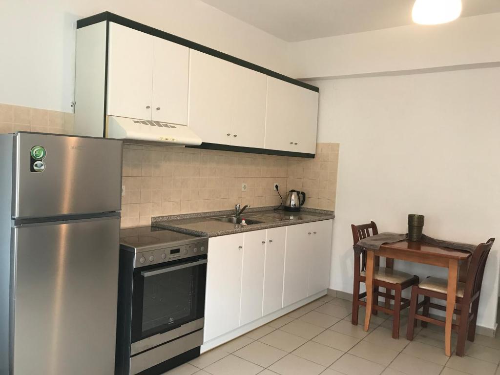 Kuchyň nebo kuchyňský kout v ubytování Kimata Apartments