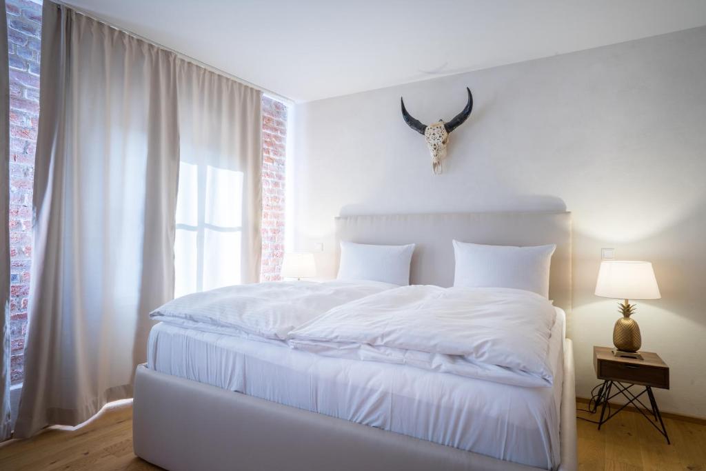 Postel nebo postele na pokoji v ubytování Hotel Rote19