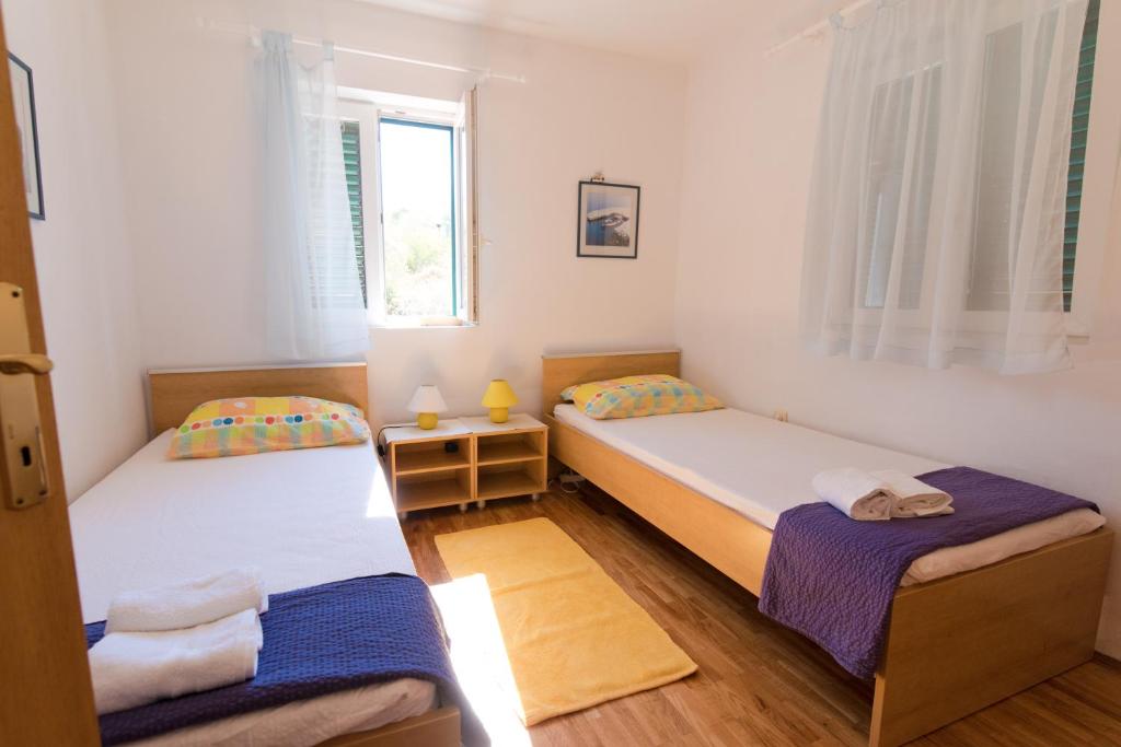Krevet ili kreveti u jedinici u objektu Sali Modern Seaview Apartment