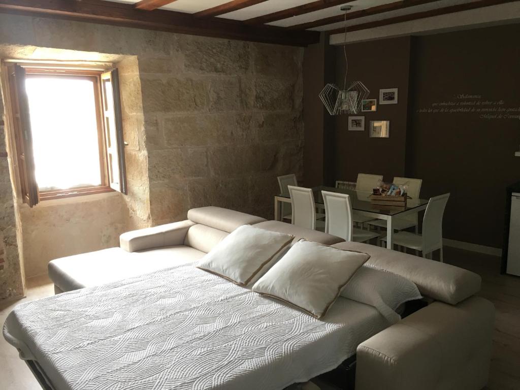 Posteľ alebo postele v izbe v ubytovaní Apartamento Ribera Del Puente