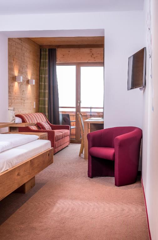 Posteľ alebo postele v izbe v ubytovaní Hotel Leonhard