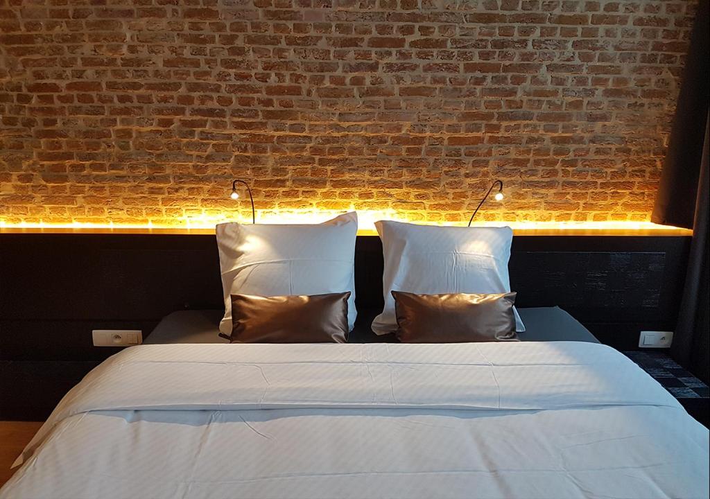 Postel nebo postele na pokoji v ubytování Hotel Goodnight Antwerp