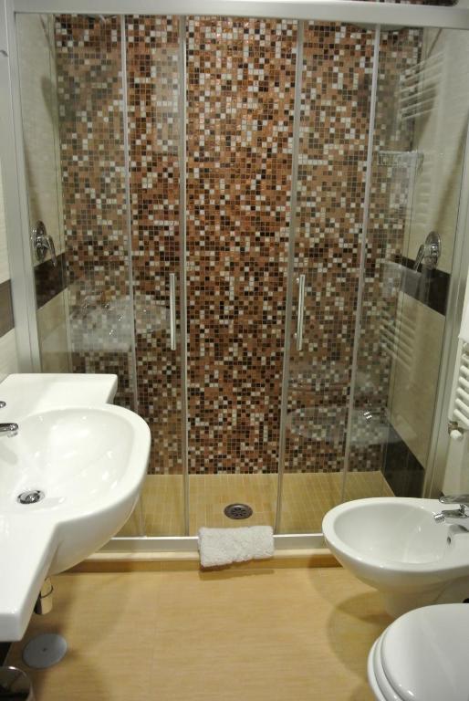 Koupelna v ubytování Hotel Dei Mille