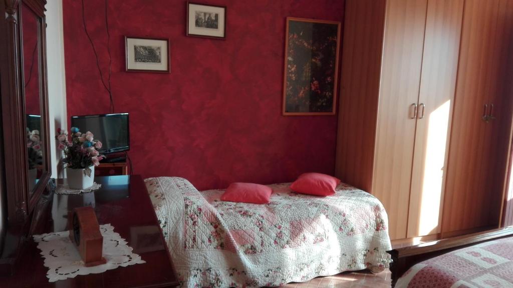 Letto o letti in una camera di B&B Curtif