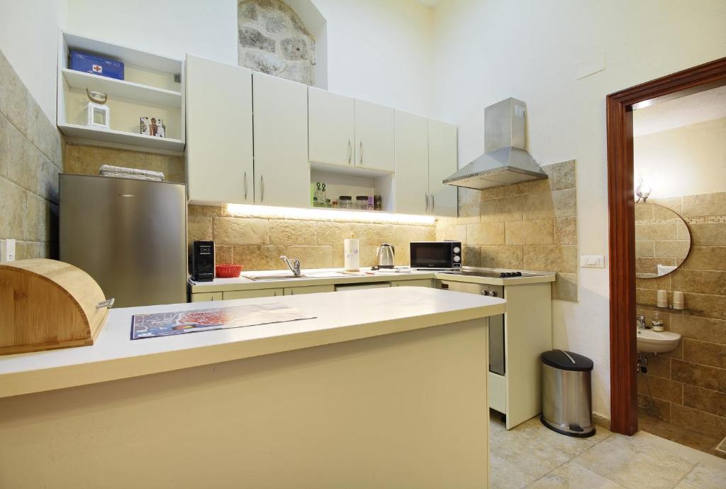 Kuchyňa alebo kuchynka v ubytovaní Apartman Nikola